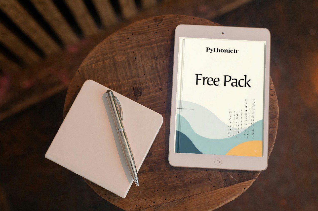 Tablet displaying a 'Free Pack' on a wooden surface with a notebook and pen.