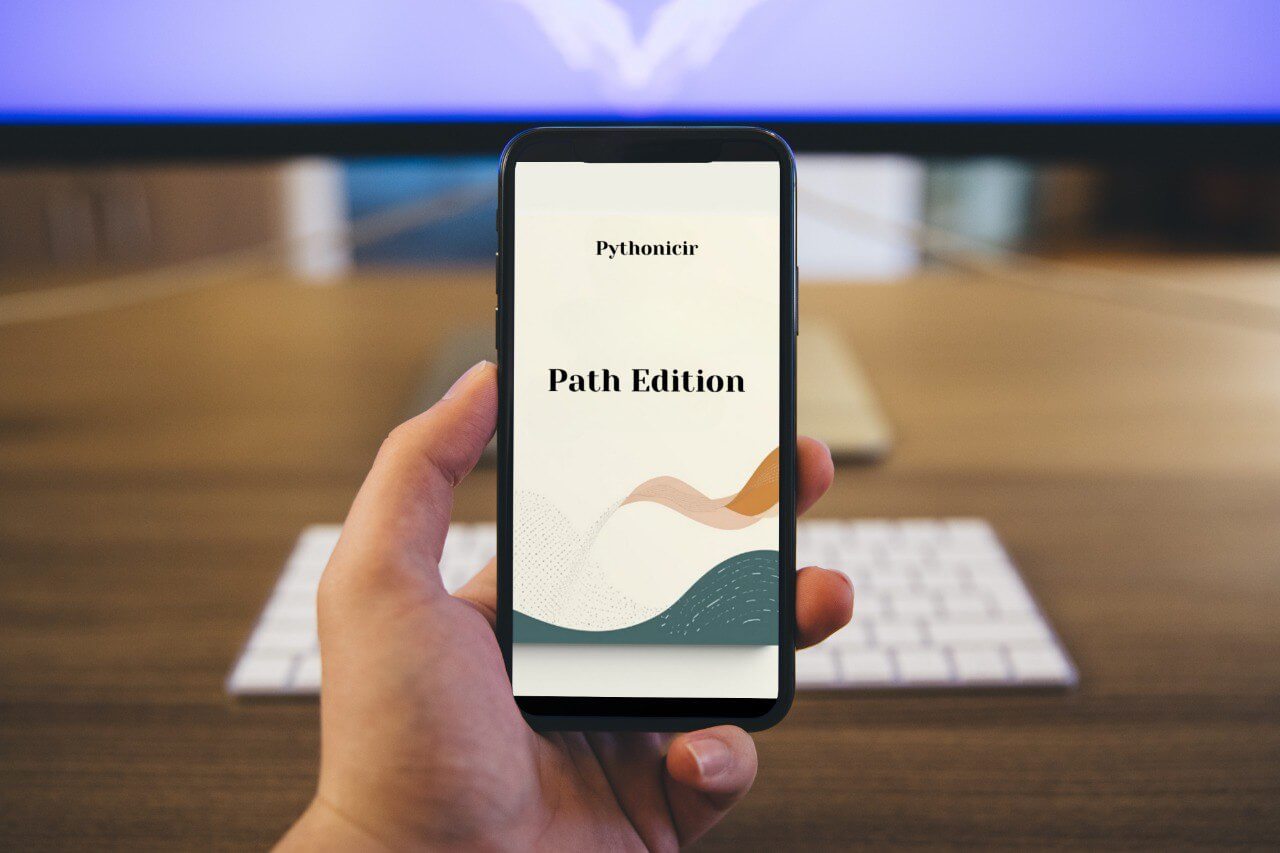 Hand holding a smartphone with 'Pythonicir Path Edition' course on screen, blurred office background